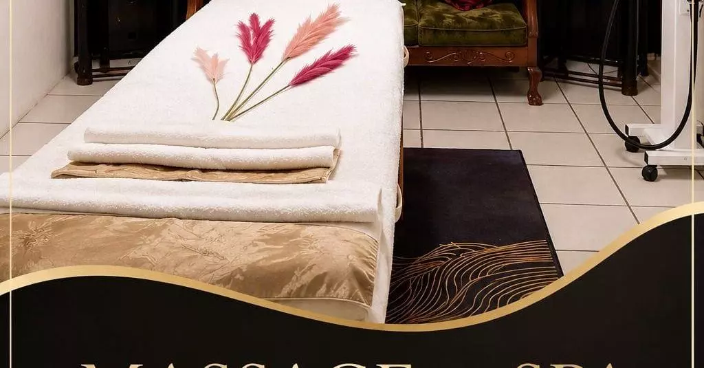 Massage spa room interior with a massage table